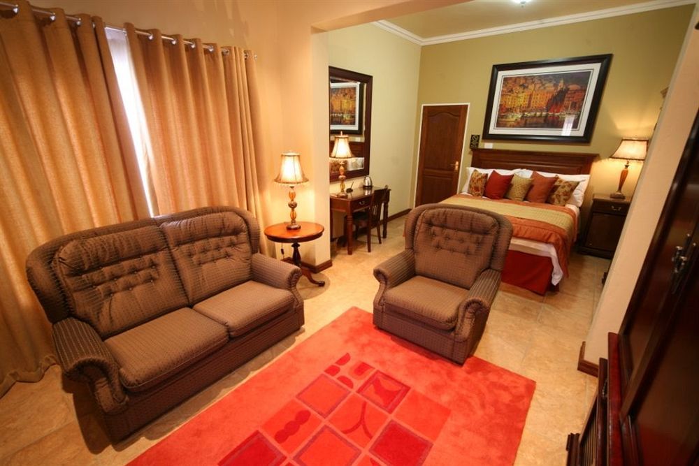 Le Cozmo Guesthouse Йоханнесбург Экстерьер фото